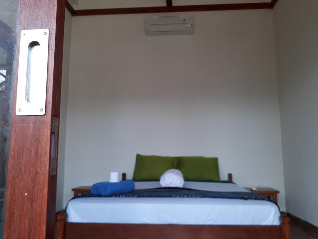 Kuta Bay Homestay Habitación foto